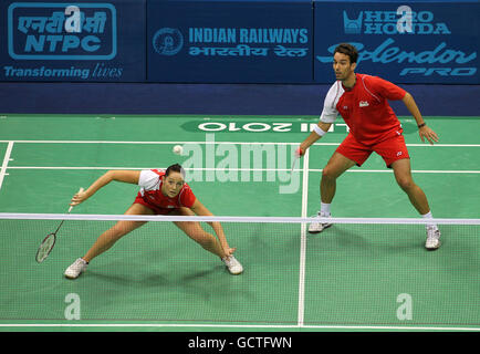 England's Nathan Robertson and Jenny Wallwork (left) in action against Malaysia's Kien Koo and Ee Chin in the mixed doubles final of the badminton competition during Day Eleven of the 2010 Commonwealth Games at the Siri Fort Sports Complex in New Delhi, India. Stock Photo