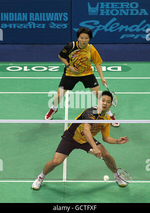 Malaysia's Kien Koo and Ee Chin in action against England's Nathan Robertson and Jenny Wallwork in the mixed doubles final of the badminton competition on day eleven of the 2010 Commonwealth Games at the Siri Fort Sports Complex in Delhi, India Stock Photo