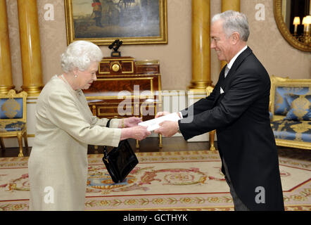 Queen Elizabeth II receives the credentials of His Excellency the Ambassador of Switzerland, Mr Anton Thalmann at Buckingham Palace in London. Stock Photo