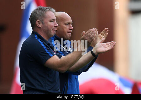 soccer - Clydesdale Bank Premier League - Rangers v Motherwell - Ibrox. Rangers' assistant manager Ally McCoist (left) and first team coach Kenny McDowall (right) Stock Photo