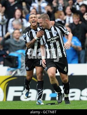 Newcastle United's Kevin Nolan (right) celebrates scoring his sides second goal of the game with teammate Danny Simpson (left) Stock Photo