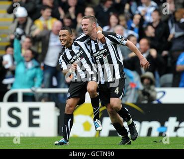 Newcastle United's Kevin Nolan (right) celebrates scoring his sides second goal of the game with teammate Danny Simpson (left) Stock Photo