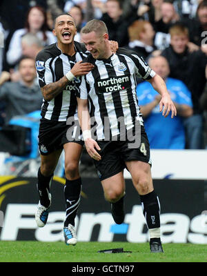 Newcastle United's Kevin Nolan (right) celebrates after scoring his second goal during the Barclays Premier League match at St James' Park, Newcastle. Stock Photo