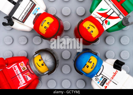 Tambov, Russian Federation - July 06, 2016 Four Lego driver minifigures on Lego gray baseplate background. Studio shot. Stock Photo