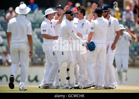 England's Graeme Swann celebrates dismissing Western Australia's Luke Pomersbach during the tour match at the WACA, Perth. Stock Photo