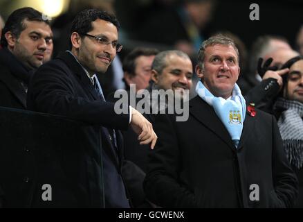 Soccer - Barclays Premier League - Manchester City v Manchester United - City of Manchester Stadium. Manchester City chairman Khaldoon Al Mubarak (left) and Executive Chairman Garry Cook (right) in the stands Stock Photo