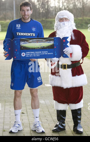 SPECIAL PICTURE - RELEASED EXCLUSIVELY THROUGH THE PRESS ASSOCIATION FOR USE BY NATIONAL AND REGIONAL NEWSPAPERS - UK & IRELAND ONLY. NO SALES. Rangers' Kirk Broadfoot promotes Christmas Season ticket prices. Stock Photo