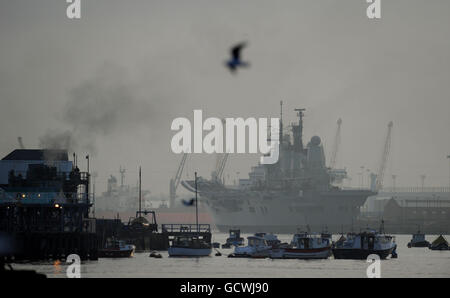 The Ark Royal arrives on the River Tyne for the last time before she is decommissioned. Her farewell voyage took her around the north of Scotland, before she made the short journey down the north east coast of England and into Newcastle, where she was built by Swan Hunters at Wallsend. Stock Photo