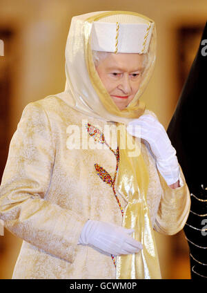 Britain's Queen Elizabeth II, walks through the Sheikh Zayed Grand Mosque in Abu Dhabi, as part of a five-day state visit to the Gulf. Stock Photo