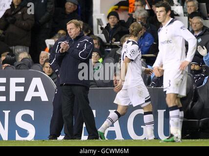 Tottenham Hotspur's Roman Pavlyuchenko (right) walks past manager Harry Redknapp after being substituted Stock Photo