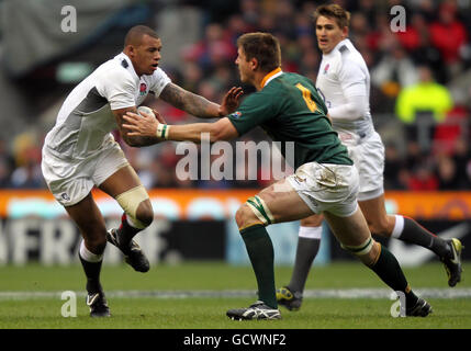 Rugby Union - Investec Challenge Series 2010 - England v South Africa - Twickenham Stadium. England's Courtney Lawes hands off South Africa's Bakkies Botha during the Investec Challenge Series match at Twickenham Stadium, London. Stock Photo