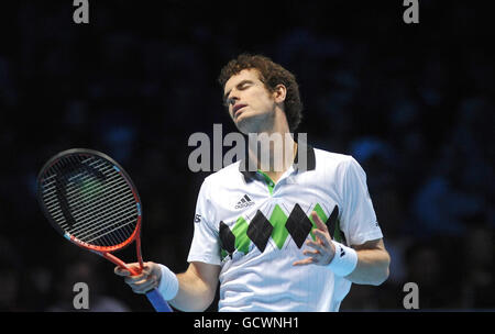 Great Britain's Andy Murray shows his frustration as he competes against Spain's Rafael Nadal during day seven of the Barclays ATP World Tennis Tour Finals at the O2 Arena, London. Stock Photo