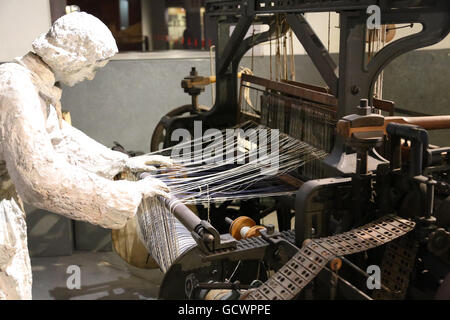 Textile mills. 19th century. Woman worked in textile industry. Reproduction. Spain.Museum of the History of Catalonia, Barcelona Stock Photo