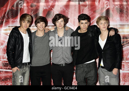 One Direction (left to right) Liam Payne, Louis Tomlinson, Harry Styles, Zayn Malik and Niall Horan attending a press conference for X Factor, at The Connaught Hotel in central London. Stock Photo