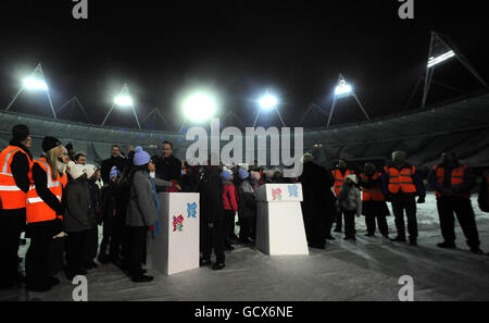 Olympics - Olympic Stadium Floodlight Switching On Ceremony - Olympic Park. The Olympic Stadium floodlights are officially switched on by Prime Minister David Cameron at the Olympic Park in Stratford, London. Stock Photo