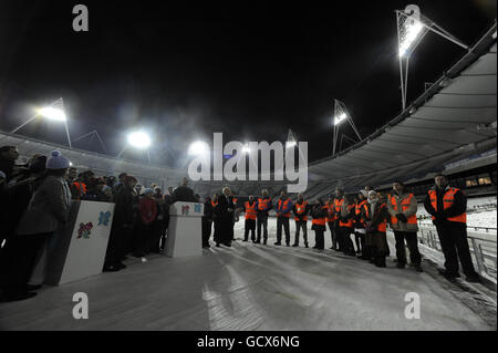 The Olympic Stadium floodlights are officially switched on by Prime Minister David Cameron at the Olympic Park in Stratford, London. Stock Photo