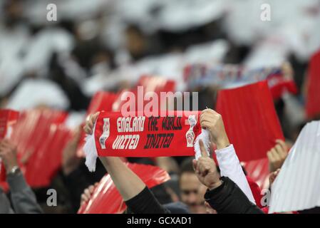 Soccer - International Friendly - England v France - Wembley Stadium. An England fan in the stands holds up a scarf with a Back The Bid message for England's 2018 World Cup host bid Stock Photo