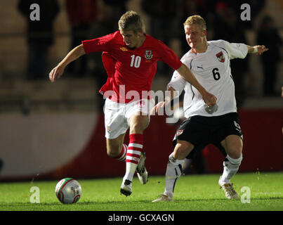 Soccer - Under 21 International Friendly - Wales v Austria - Newport Stadium. Wales' Ryan Doble gets away from Austria's Thomas Hopfer (right) during the U21 International Friendly at Newport Stadium, Newport. Stock Photo