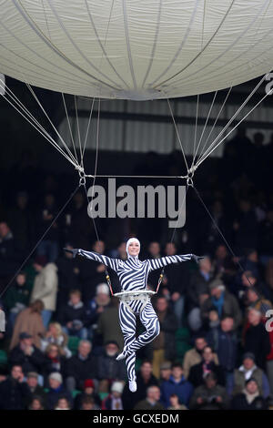 An Aerial acrobat entertains the crowd before kick off Stock Photo