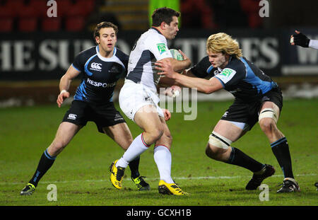 Glasgow's Ruaridh Jackson and Richie Gray and Toulouses Byron Kelleher during the Heineken Cup match at Firhill, Glasgow. Stock Photo