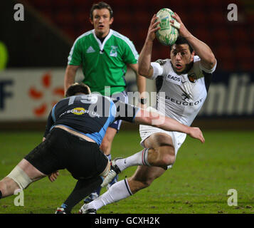 Glasgow's Alastair Muldowney and Toulouse's Byron Kelleher during the Heineken Cup match at Firhill, Glasgow. Stock Photo