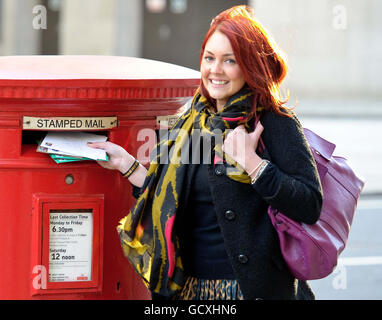 Actress Lacey Turner promotes the Royal Mail's latest recommended posting dates of 18th December for 2nd Class Mail, and 21st December for 1st Class Mail, in central London. Stock Photo