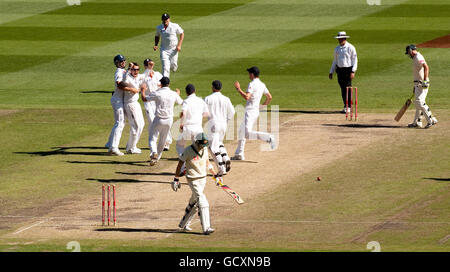 England's Graeme Swann celebrates dismissing Australia's Michael Clarke during the fourth test at Melbourne Cricket Ground in Melbourne, Australia. Stock Photo