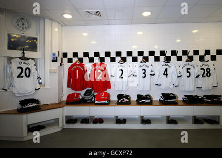 Soccer - Barclays Premier League - Fulham v Birmingham City - Craven Cottage. Fulham shirts hang in the changing room Stock Photo