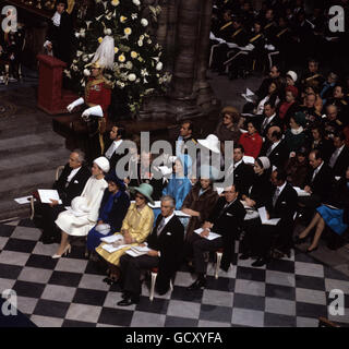 Foreign Royalty attending the wedding of the Princess Royal, Princess Anne and Captain Mark Phillips at Westminster Abbey. Among foreign royalty were, in front row (left to right), Prince Ranier of Monaco; Princess Grace; Princess Margarita of Hohenlohe-Langenburg, (sister of Prince Philip); Princess and Prince George of Hanover. Second Row: King Constantine of the Hellenes; Queen Anne-Marie of the Hellenes; the Crown Prince and Princess of Norway; Princess Beatrix and Prince Claus of the Netherlands. Third row: Prince and Princess of Spain and Prince Alexander of Yugoslavia. Stock Photo