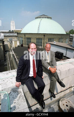 Architect Sir Norman Foster, right, with the director of the British Museum, Dr Robert Anderson, on the roof of its building in London, where it was announced that Sir Norman is to oversee a 55 million to use the library space when it moves to St Pancras. Stock Photo