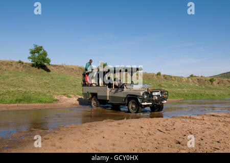 Jeep during a safari, Masai Mara National Reserve, Kenya, Africa Stock Photo