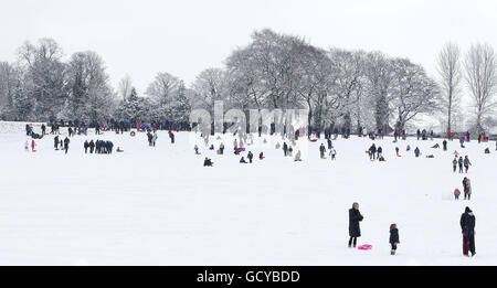 Winter weather December 18th. People have fun in the snow in Woolton, Liverpool. Stock Photo
