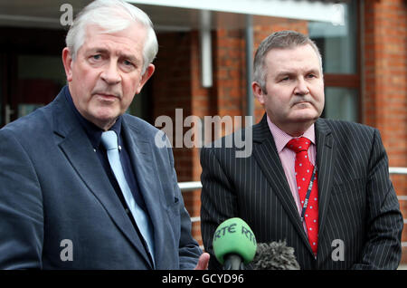 Padraic White (left) Interim Chairman and Laurence MacKenzie, Chief Executive Officer (right) both from Northern Ireland Water speak to the media in Belfast as tens of thousands of homes and businesses are still without supplies as engineers struggle to plug burst pipes. Some families have not had fresh running water for eight days. Stock Photo
