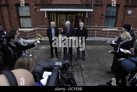 Senior figures from Northern Ireland Water (NIW) (left to right) Kevin Steele, Interim chairman Padraic White and Peter Bunting, speak to the media outside the company's headquarters in North Belfast as they emerge from a special board meeting to say their priority was to fix the leaks that have crippled the supply system. Stock Photo