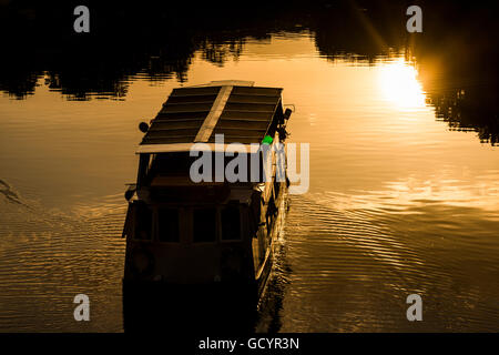 Sabrina pleasure boat sailing into the sunset on the River Severn in Shrewsbury, Shropshire, England, UK. Stock Photo