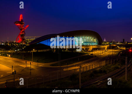 London, England - May 27, 2016: Night view of the illuminated London Aquatics Centre, Olympic stadium and ArcelorMittal Orbit Stock Photo