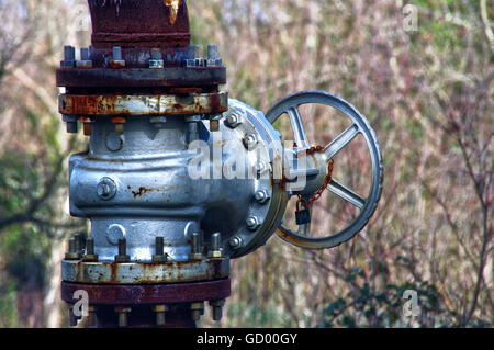 pipeline of a pipe for the gas, closed with force and with a chain with padlock Stock Photo