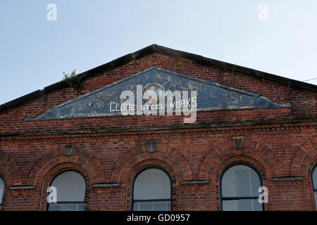 Globe Steel Works sign on derelict industrial building in Sheffield England Stock Photo