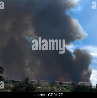 Thick smoke is seen for miles from the I 5 freeway from a 3rd alarm ...
