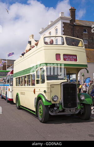 Poole, Dorset, UK. 10 July 2016. Hants & Dorset (More Bus) centenary celebrates in style for its 100th birthday at Poole Quay with vintage bus rides, displays and family entertainment. Credit:  Carolyn Jenkins/Alamy Live News Stock Photo