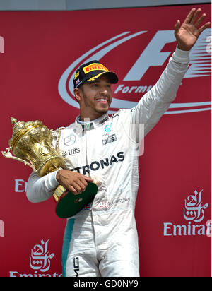 Silverstone, UK. 10th July, 2016. British F1 Grand Prix at Silverstone UK Race  Race winner Lewis Hamilton GBR Marcedes AMG Petronas on the podium Credit:  Leo Mason/Alamy Live News Stock Photo