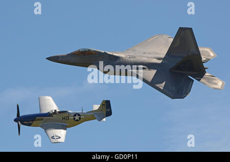 Heritage Flight Lockheed Martin F-22 Raptor and North American P-51 Mustang named Miss Helen Stock Photo