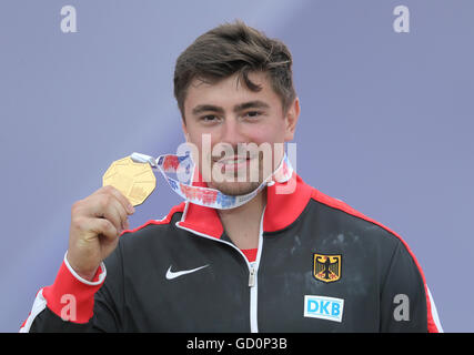 German David Storl shows his shot put gold medal at the European Athletics Championships 2016 at the Olympic Stadium in Amsterdam, The Netherlands, 10 July 2016. Photo: Michael Kappeler/dpa Stock Photo