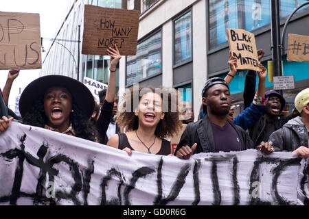 London, UK. 10th July, 2016. “Black Lives Matter”!  Over a thousand people marched down Oxford Street  and on to Parliament Square outraged by police brutality in the US after the police killing of two black men - one in Minnesota and one in Louisiana. “Hands up Don’t shoot” photos by Janine Wiedel 10.7.16 London Credit:  Janine Wiedel Photolibrary/Ģ����ý Live News Stock Photo