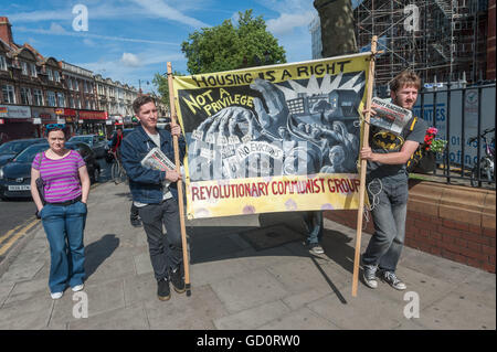 London, UK. 10th July 2016. Housing action group Focus E15 who in previous years have been assaulted and ejected at the Mayor's Newham Show march from their street stall on Barking Road to the nearby former Police Station where they have temporarily occupied the balconies. Credit:  Peter Marshall/Alamy Live News Stock Photo