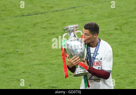 Paris, France. 10th July, 2016. Cristiano Ronaldo of Portugal celebrates with the trophy after the Euro 2016 final football match between Portugal and France in Paris, France, July 10, 2016. Portugal won 1-0 to claim the title. Credit:  Bai Xuefei/Xinhua/Alamy Live News Stock Photo