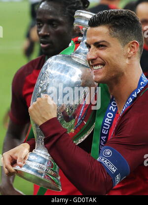 Portugal's Cristiano Ronaldo Celebrates With The Trophy On The Pitch ...