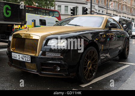 London, UK.  11 July 2016.  A supercar passes down Knightbridge.  Some drivers of these supercars, the majority of which have been shipped over from the Middle East for the summer, have faced restrictions from Kensington and Chelsea borough council after complaints from local residents about their driving too fast and too noisily.  Credit:  Stephen Chung / Alamy Live News Stock Photo
