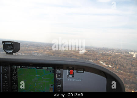 Kiev, Ukraine - November 12, 2010: Approaching the airport for landing from the cockpit of the Cessna 172 Skyhawk Stock Photo