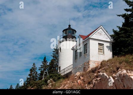 Bass Harbor lighthouse sits atop a rocky cliff in Acadia National Park, in Maine. Stock Photo